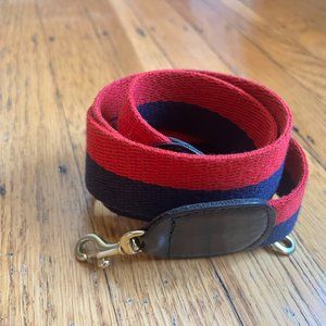 Clare V webbed long crossbody strap in navy and red